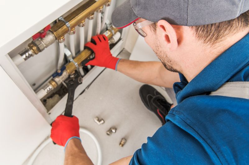 Plumber Fixing Pipe